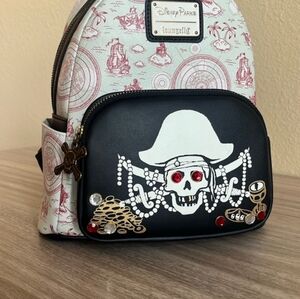 Loungefly Disney Parks Red and Cream Backpack